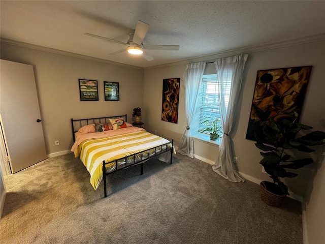 2425 Ashdale Dr Unit 101, Austin, TX 78757 - bedroom featuring ornamental molding, carpet flooring, ceiling fan, baseboards, and a textured ceiling