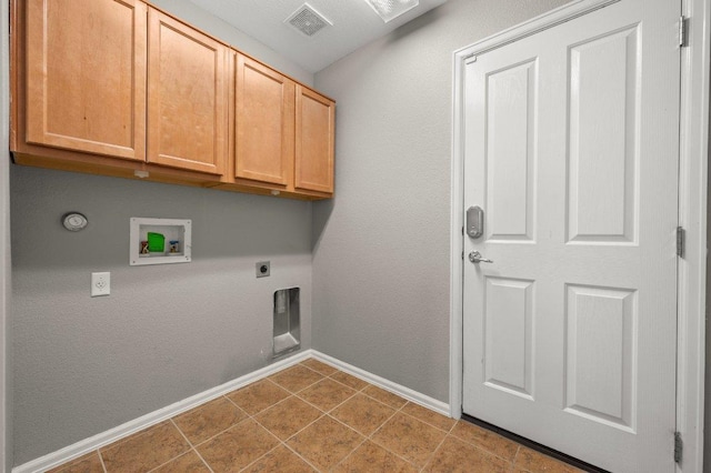 141 Snowy Egret Ln, Leander, TX 78641 - laundry room with hookup for a washing machine, cabinet space, hookup for an electric dryer, and baseboards