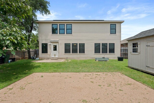141 Snowy Egret Ln, Leander, TX 78641 - back of house featuring a patio and an outdoor structure