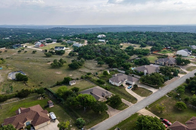 115 Greenridge Ln, Dripping Springs, TX 78620 - aerial overview of property's location featuring nearby suburban area