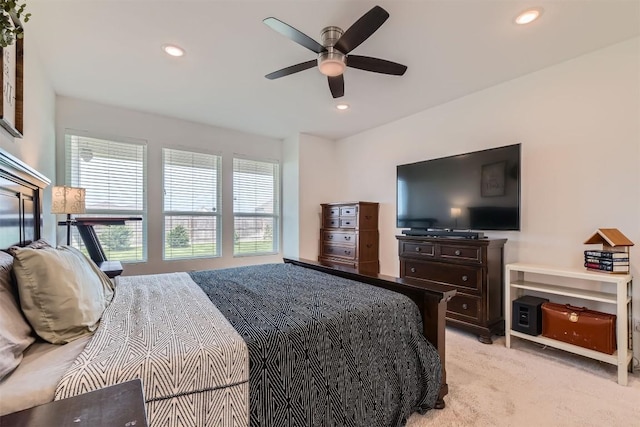 206 Monteforte Rd, Hutto, TX 78634 - bedroom with multiple windows, light carpet, recessed lighting, and a ceiling fan