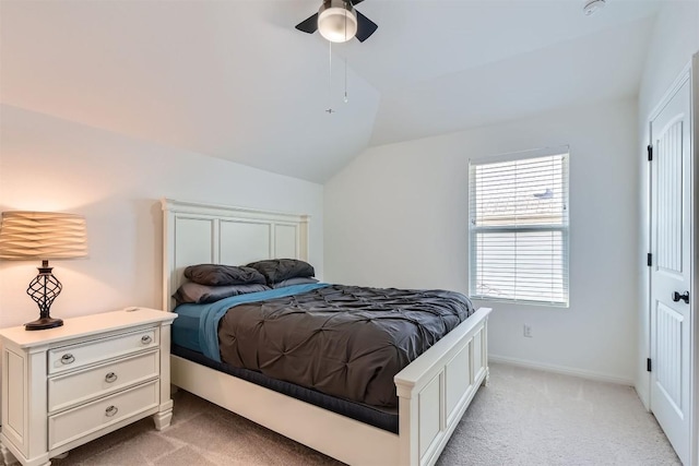 206 Monteforte Rd, Hutto, TX 78634 - bedroom with lofted ceiling, light colored carpet, a ceiling fan, and baseboards