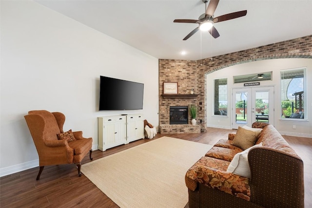 152 Baretta Loop, Buda, TX 78610 - living room featuring healthy amount of natural light, baseboards, wood finished floors, and ceiling fan