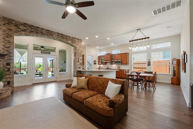 152 Baretta Loop, Buda, TX 78610 - living area featuring a ceiling fan, dark wood finished floors, baseboards, recessed lighting, and french doors