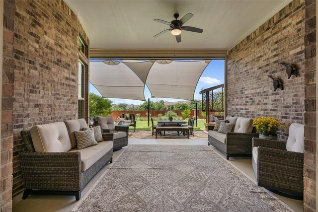 152 Baretta Loop, Buda, TX 78610 - view of patio / terrace featuring an outdoor living space, ceiling fan, outdoor dining area, and fence