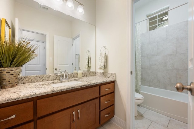 152 Baretta Loop, Buda, TX 78610 - bathroom featuring tile patterned floors, toilet, vanity, and shower / tub combo