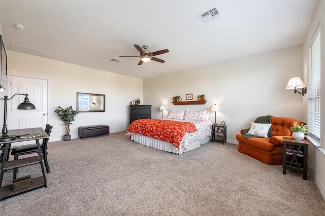 152 Baretta Loop, Buda, TX 78610 - bedroom with carpet floors, baseboards, and ceiling fan