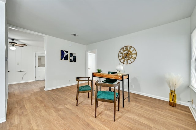 1408 Kent St, Taylor, TX 76574 - dining space featuring light wood-style floors, ceiling fan, and baseboards