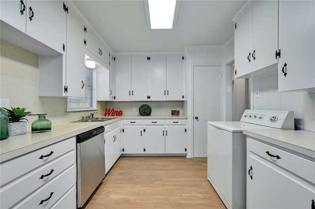 1408 Kent St, Taylor, TX 76574 - kitchen with washer / clothes dryer, stainless steel dishwasher, a sink, and light countertops