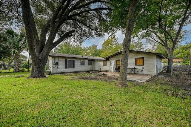 1408 Kent St, Taylor, TX 76574 - rear view of property with a patio