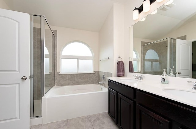 112 Moulins Ln, Georgetown, TX 78626 - full bath with a shower stall, a garden tub, double vanity, and lofted ceiling