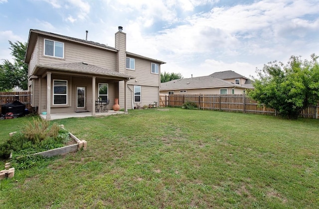 112 Moulins Ln, Georgetown, TX 78626 - back of house featuring a patio and a chimney