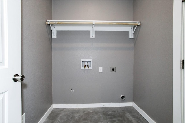 clothes washing area featuring hookup for an electric dryer, hookup for a washing machine, baseboards, and gas dryer hookup