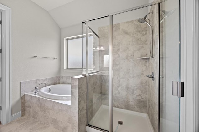 316 Barrel Bnd, Georgetown, TX 78628 - bathroom featuring a garden tub, a shower stall, and lofted ceiling
