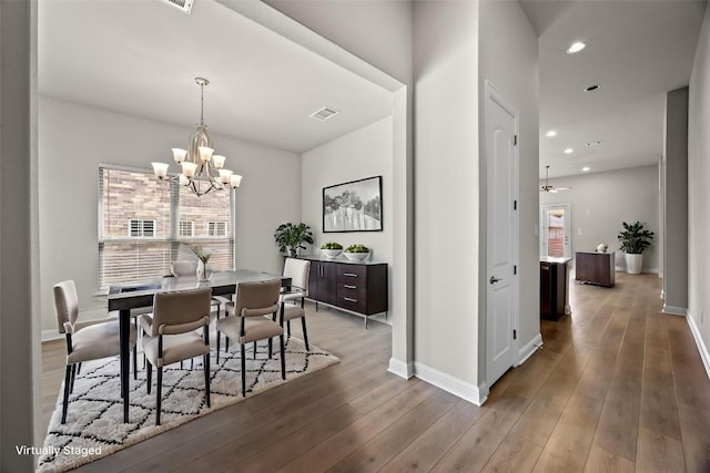 316 Barrel Bnd, Georgetown, TX 78628 - dining space with a chandelier, wood finished floors, and recessed lighting
