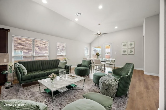 316 Barrel Bnd, Georgetown, TX 78628 - living area featuring ceiling fan, vaulted ceiling, wood finished floors, and recessed lighting
