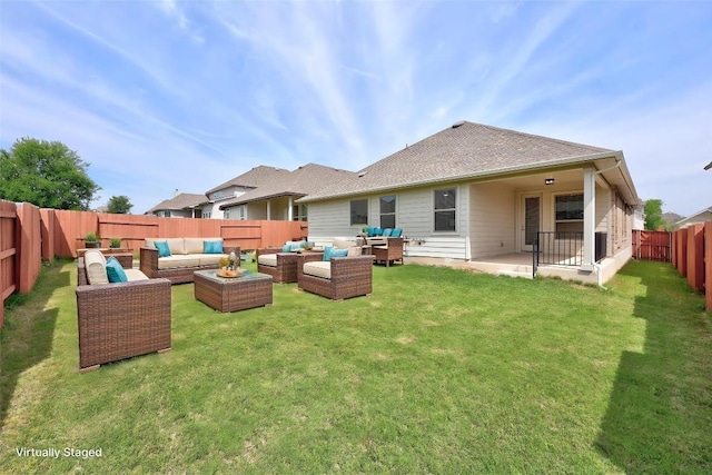 316 Barrel Bnd, Georgetown, TX 78628 - rear view of property featuring an outdoor hangout area, a fenced backyard, and a patio