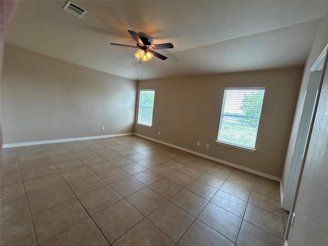 670 Covent Dr, Kyle, TX 78640 - tiled empty room with ceiling fan and baseboards