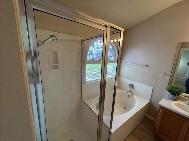 670 Covent Dr, Kyle, TX 78640 - full bathroom featuring a stall shower, a bath, vanity, and tile patterned flooring