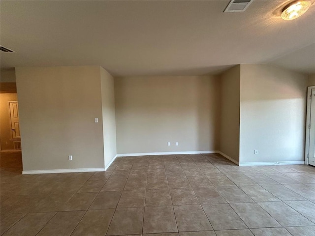 670 Covent Dr, Kyle, TX 78640 - unfurnished room featuring tile patterned flooring and baseboards