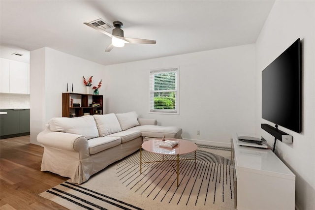 6309 Middleham Pl, Austin, TX 78745 - living area featuring light wood-style flooring and a ceiling fan