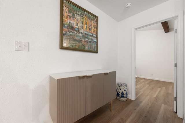 6309 Middleham Pl, Austin, TX 78745 - hallway featuring wood finished floors and radiator heating unit