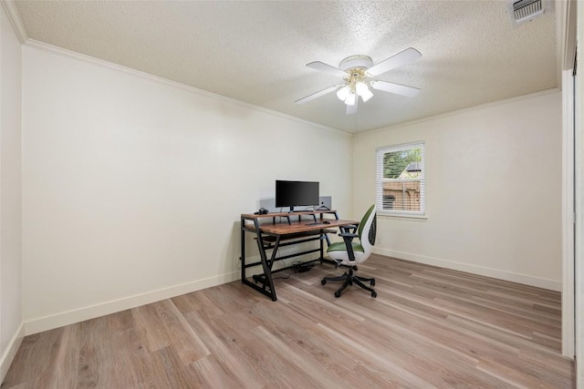 6309 Middleham Pl, Austin, TX 78745 - home office featuring ornamental molding, a textured ceiling, light wood-style flooring, and a ceiling fan
