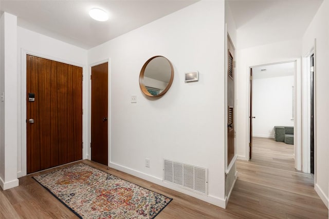 6309 Middleham Pl, Austin, TX 78745 - foyer entrance featuring wood finished floors and baseboards