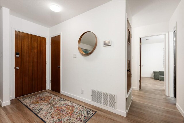 6309 Middleham Pl, Austin, TX 78745 - foyer entrance with wood finished floors and baseboards