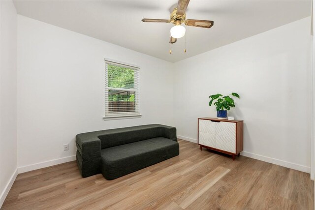 6309 Middleham Pl, Austin, TX 78745 - living area with light wood-type flooring and ceiling fan