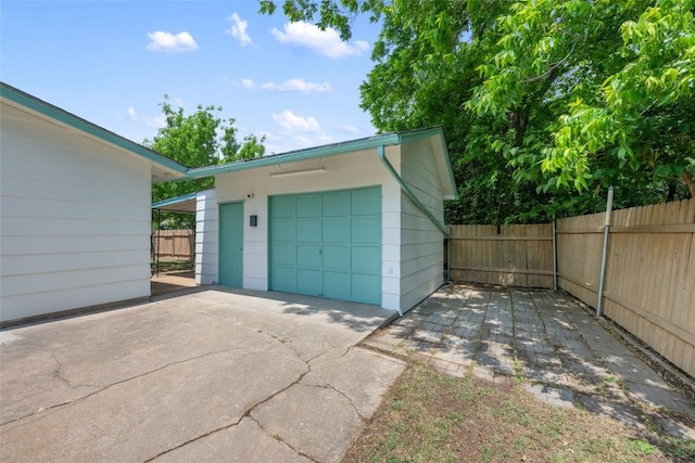 6309 Middleham Pl, Austin, TX 78745 - detached garage with concrete driveway