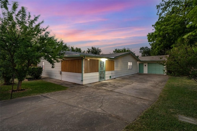 6309 Middleham Pl, Austin, TX 78745 - view of front of home featuring driveway and a garage