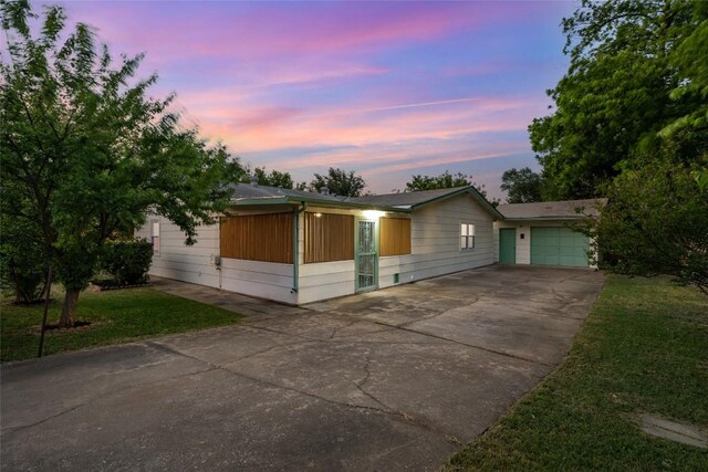 6309 Middleham Pl, Austin, TX 78745 - view of front of house with driveway and an attached garage