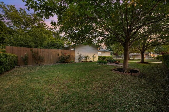 6309 Middleham Pl, Austin, TX 78745 - view of yard at dusk