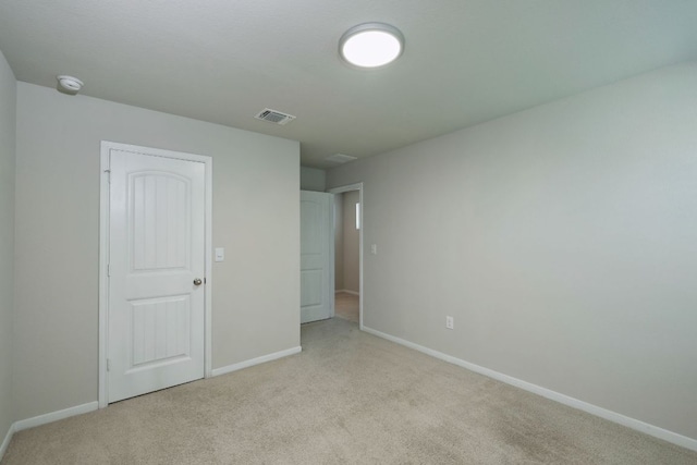 3209 Ortman Dr, Pflugerville, TX 78660 - unfurnished bedroom featuring light colored carpet and baseboards