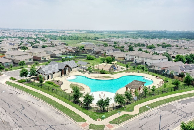 3209 Ortman Dr, Pflugerville, TX 78660 - aerial perspective of suburban area featuring a pool area