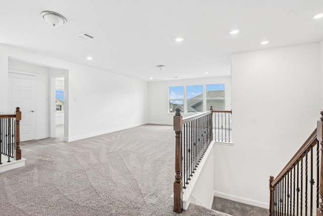 108 Redcliff Path, Kyle, TX 78640 - hallway with an upstairs landing, carpet, and recessed lighting