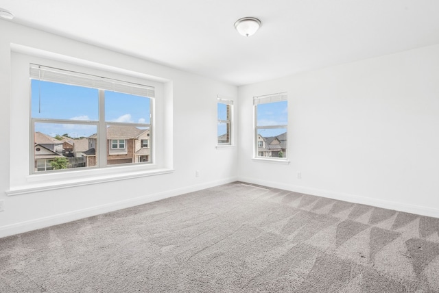 108 Redcliff Path, Kyle, TX 78640 - carpeted spare room with healthy amount of natural light and a smoke detector