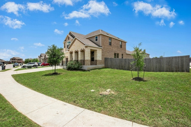 108 Redcliff Path, Kyle, TX 78640 - view of property exterior featuring brick siding, stone siding, and driveway