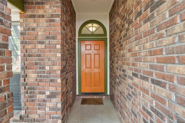 2317 Sycamore Trl, Round Rock, TX 78664 - doorway to property with brick siding