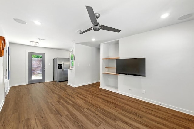 6209 Peggy St, Austin, TX 78723 - unfurnished living room featuring a ceiling fan, wood finished floors, and recessed lighting