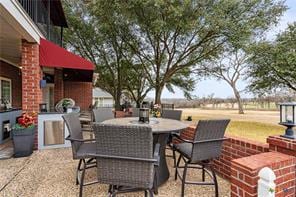 5012 Wildflower Ln, Temple, TX 76502 - view of patio / terrace with outdoor dining space