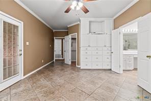 5012 Wildflower Ln, Temple, TX 76502 - unfurnished bedroom with ornamental molding, ensuite bathroom, tile patterned floors, and ceiling fan