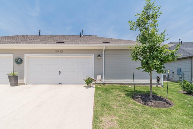 garage featuring driveway