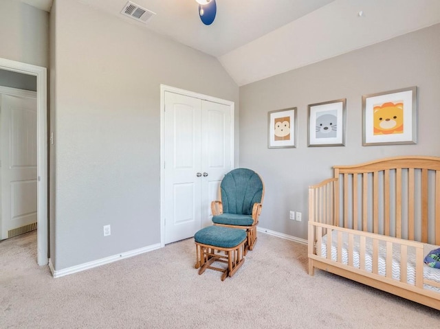 319 Sandstone Trl, Buda, TX 78610 - carpeted bedroom with a closet and vaulted ceiling