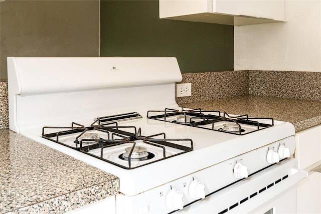5601 Woodrow Ave Unit 109, Austin, TX 78756 - kitchen view of backsplash and gas range gas stove