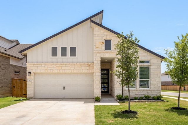 303 Kings Pine Dr, Dripping Springs, TX 78620 - view of front of house with board and batten siding, stone siding, driveway, and a front lawn