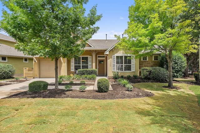 11009 Avery Station Loop Unit 32, Austin, TX 78717 - ranch-style house featuring an attached garage, a front lawn, driveway, and roof with shingles