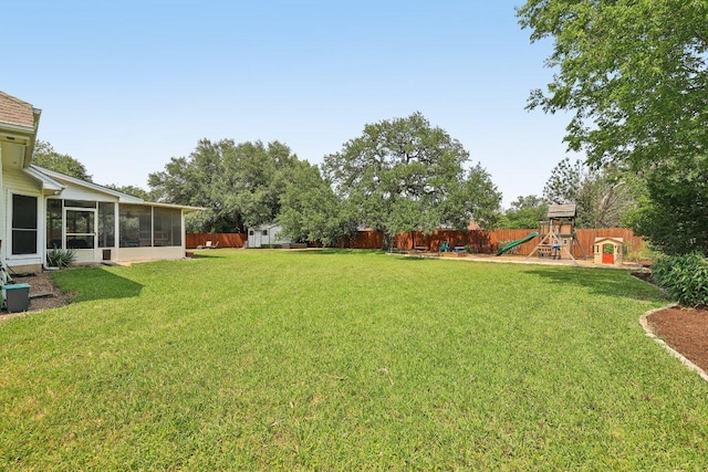 602 Leisurewoods Dr, Buda, TX 78610 - view of yard with a playground and a sunroom