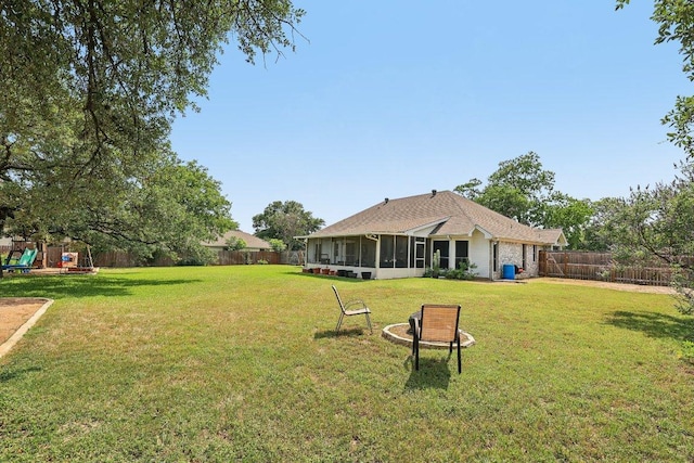 602 Leisurewoods Dr, Buda, TX 78610 - view of yard featuring a sunroom and a playground